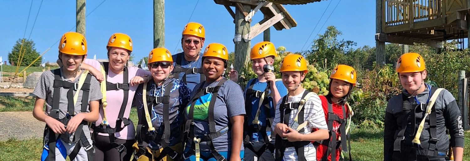 students at a ropes course